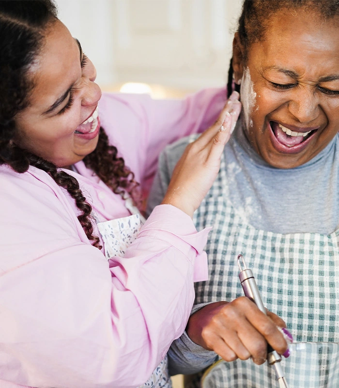 Two women having fun baking